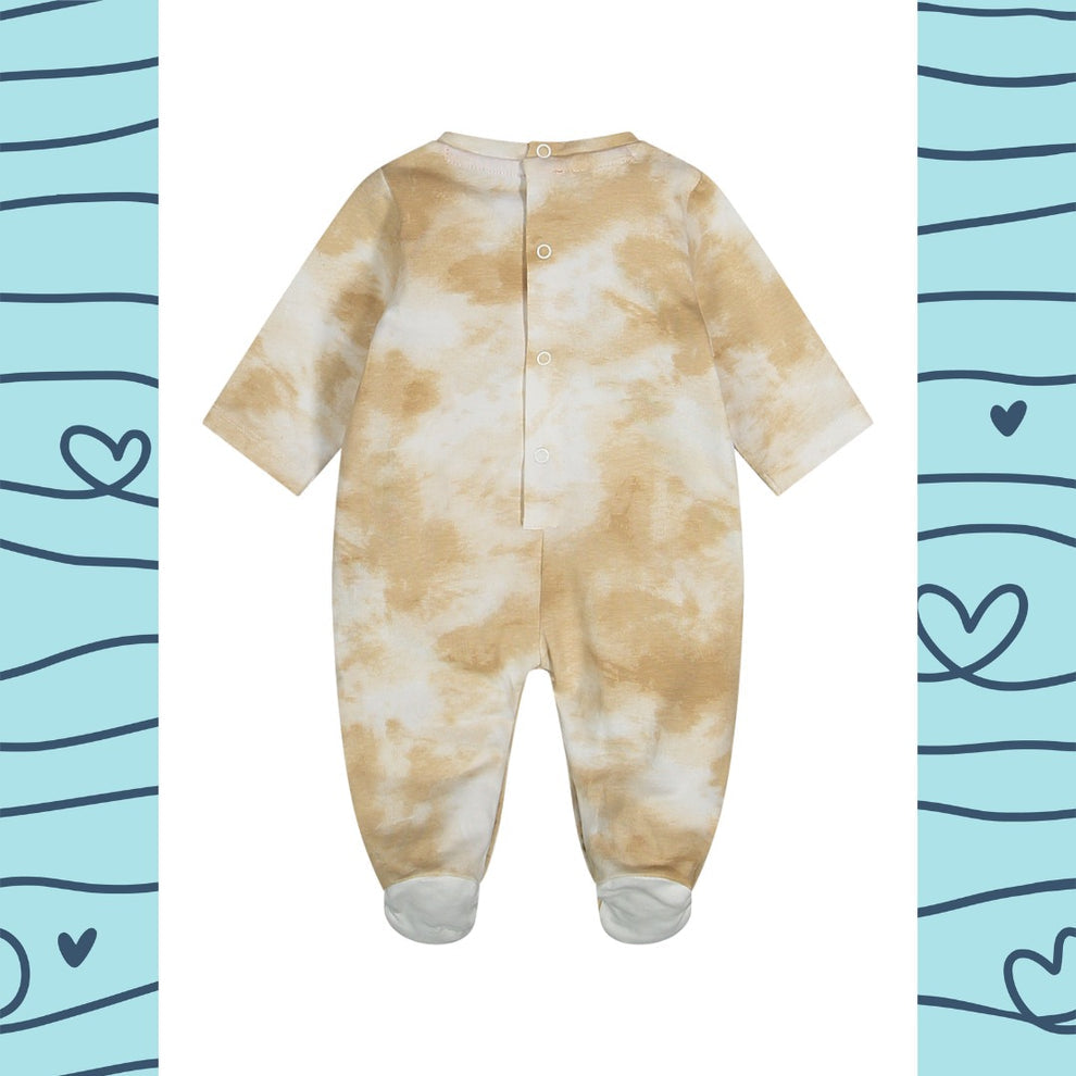 Tutina Mickey con piedi in jersey stretch.